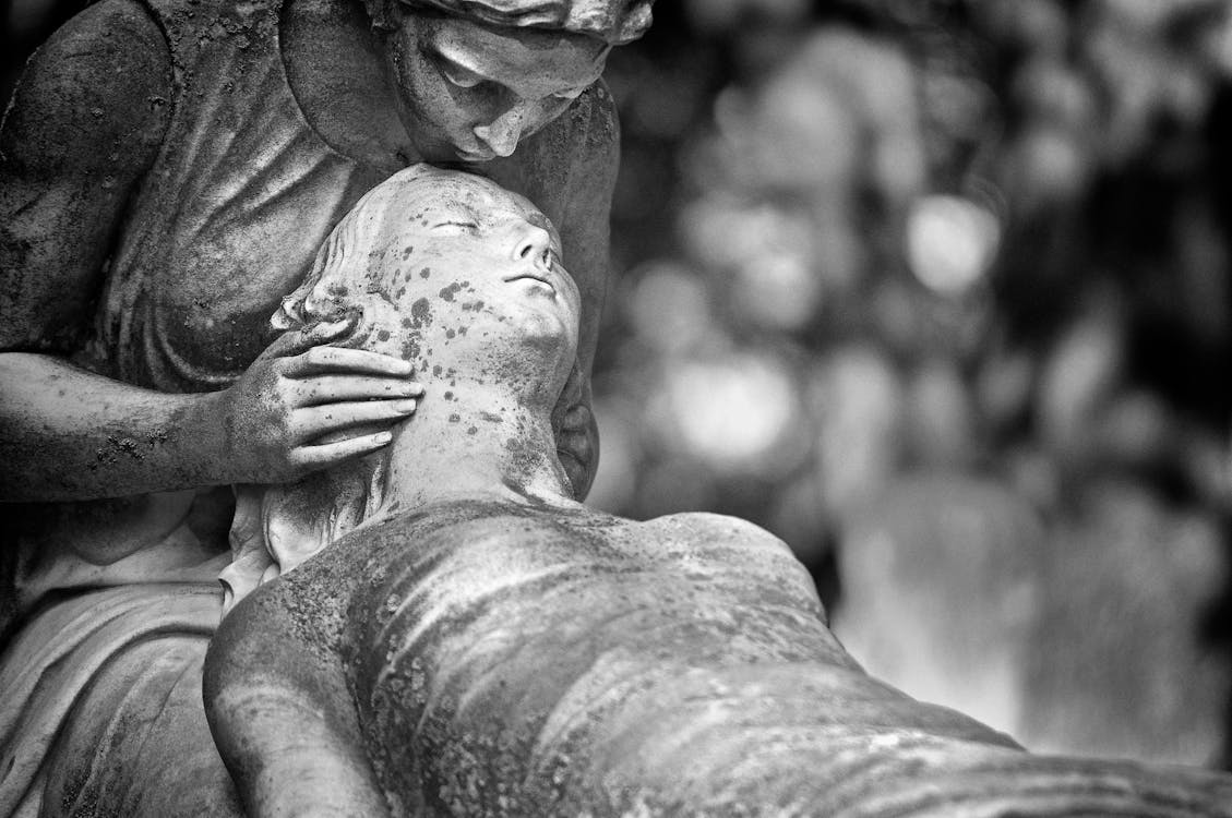 Monochrome Photo of Statue