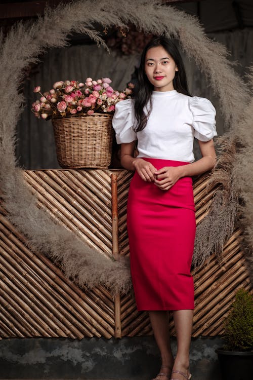 Free Woman in White Top and Red Skirt Stock Photo
