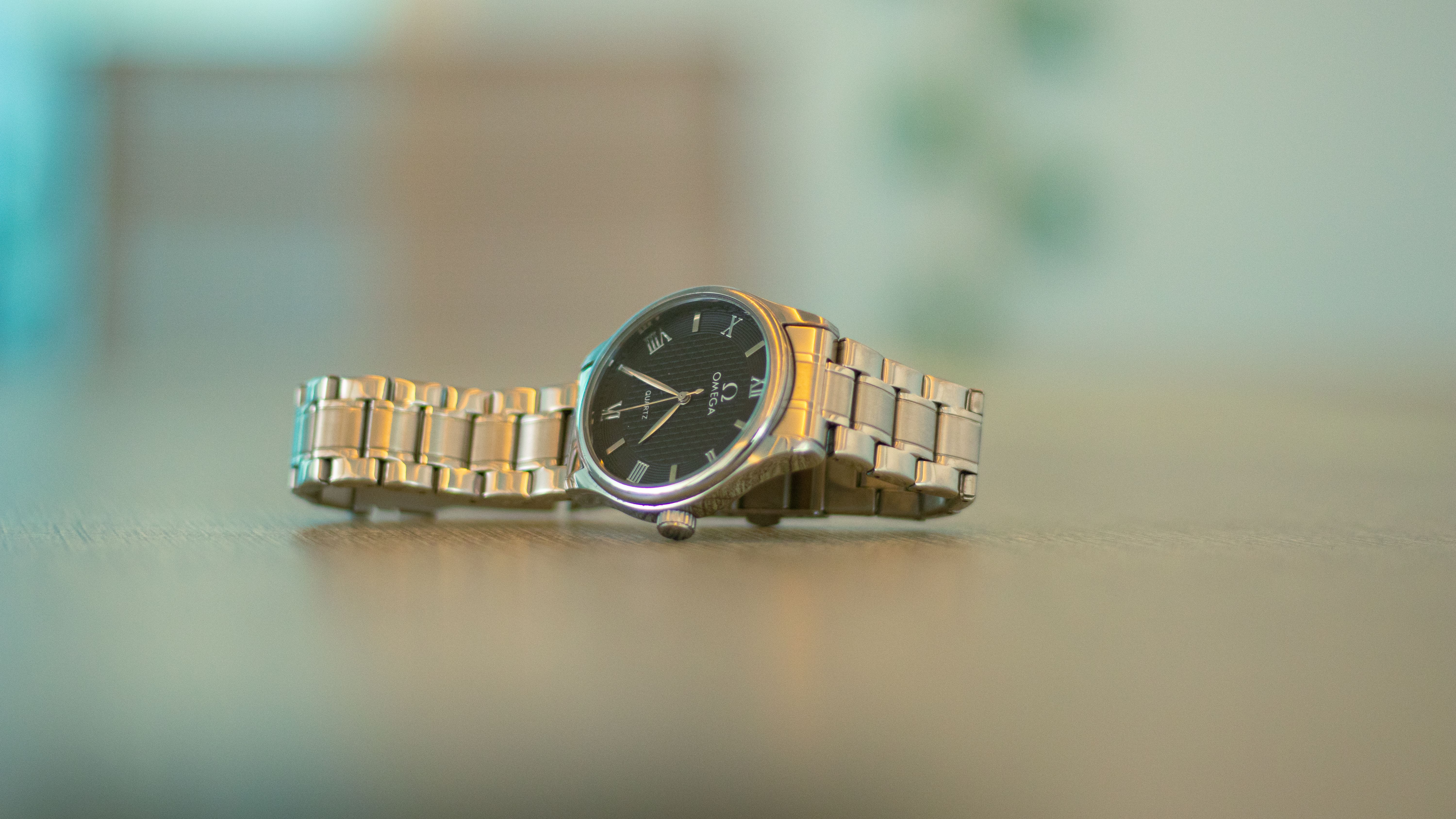 Elegant Omega wristwatch showcasing its sophisticated design in a close-up shot.