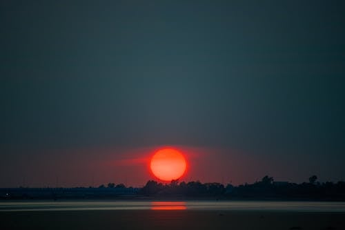 Darmowe zdjęcie z galerii z plaża, świt, wschód słońca