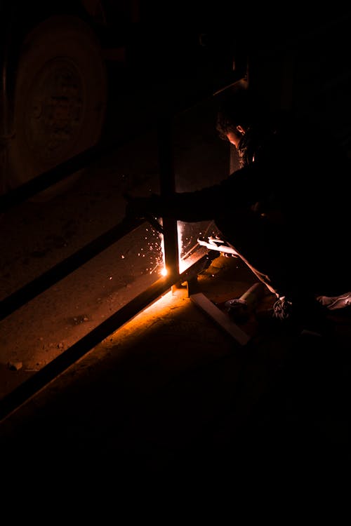 A Man Using Welding