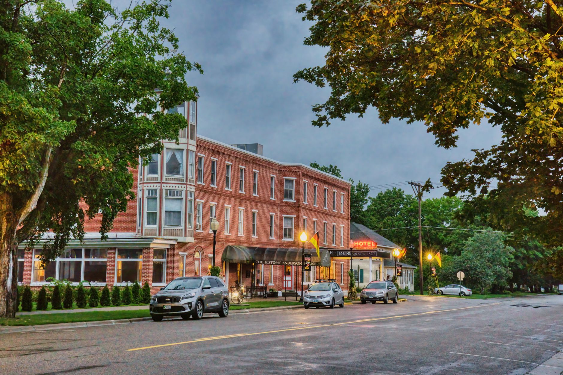 Scenic view of a historic Downtown building and street in Wabasha, MN with parked cars.