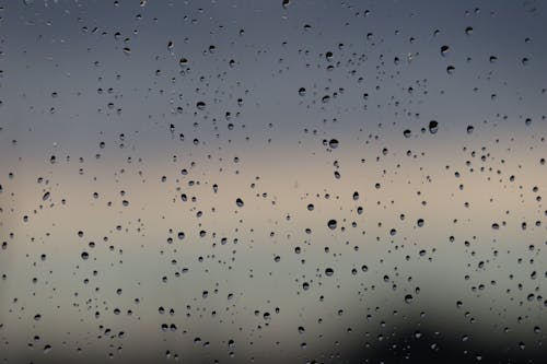Water Droplets on Glass Panel