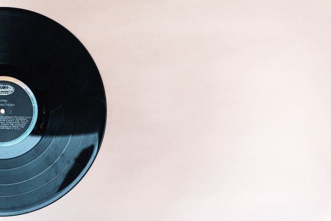 Vinyl record resting on a beige backdrop — photo by Arturo Añez on Pexels