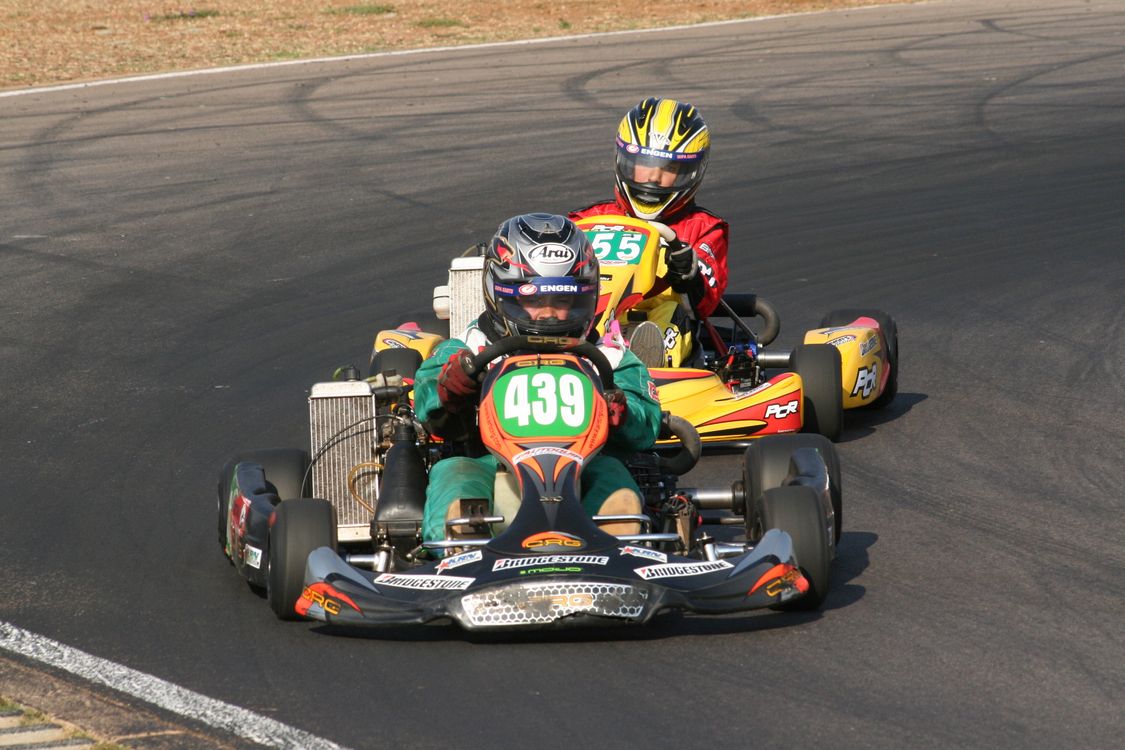Racers Driving Go Karts · Free Stock Photo
