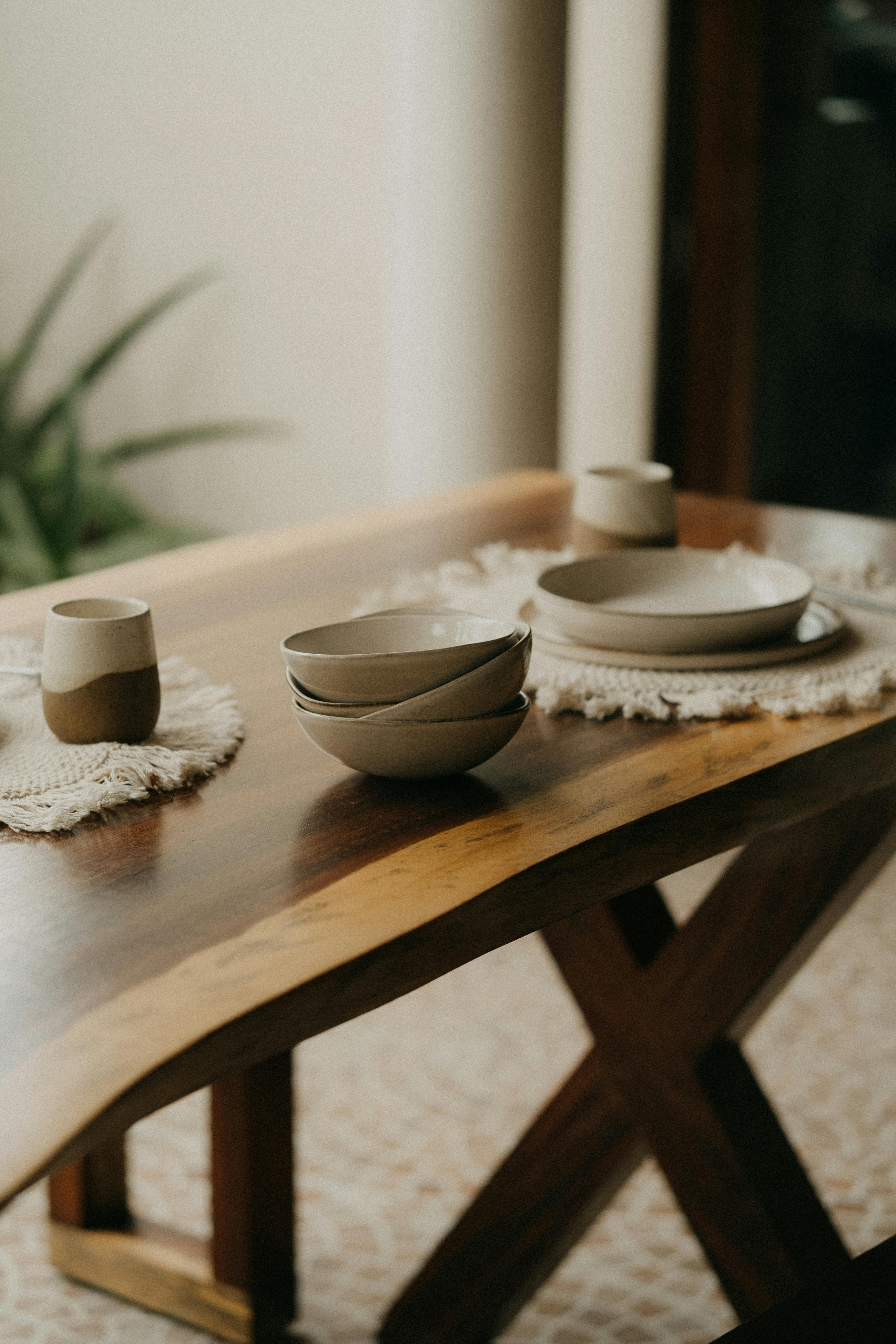 Ceramic Bowls on Wooden Table · Free Stock Photo