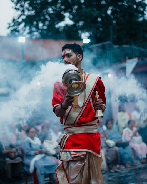 Man with Incense on a Street 