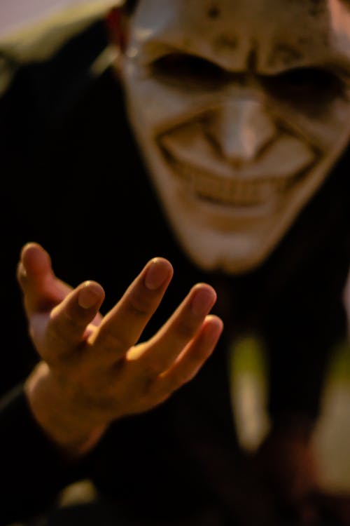 Free Man Wearing Creepy Mask Stock Photo