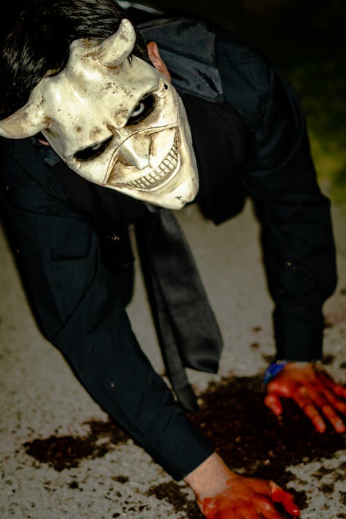 Creepy Person Wearing a Skull Mask