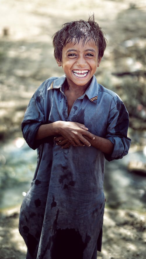 Boy in Blue Long Sleeve Dress Shirt Smiling