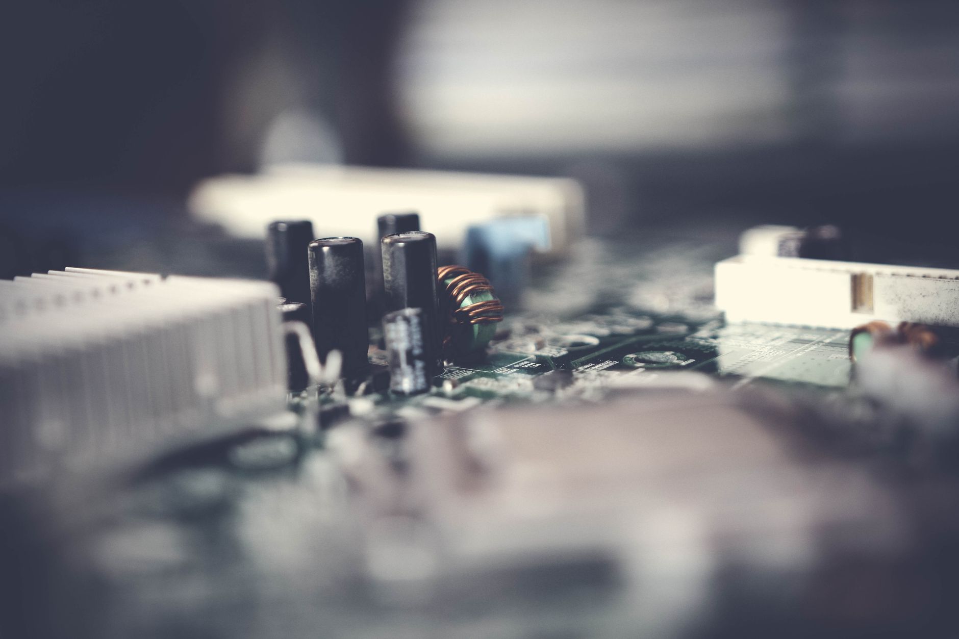 Detailed view of electronic circuit components with a soft focus effect.