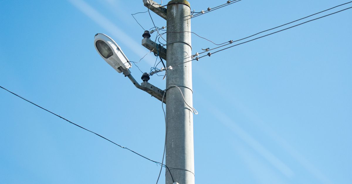 Post Below Image Electrical Post Under Blue Sky · Free Stock Photo