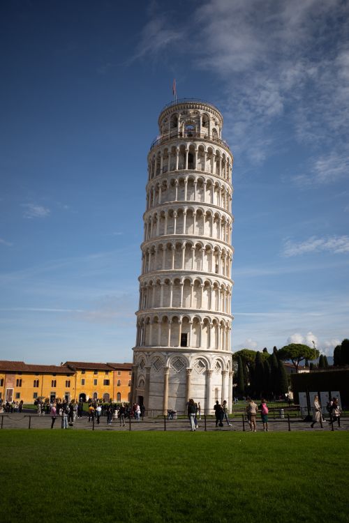 Free Magnificent view of the Leaning Tower of Pisa with tourists in Tuscany, Italy. Stock Photo