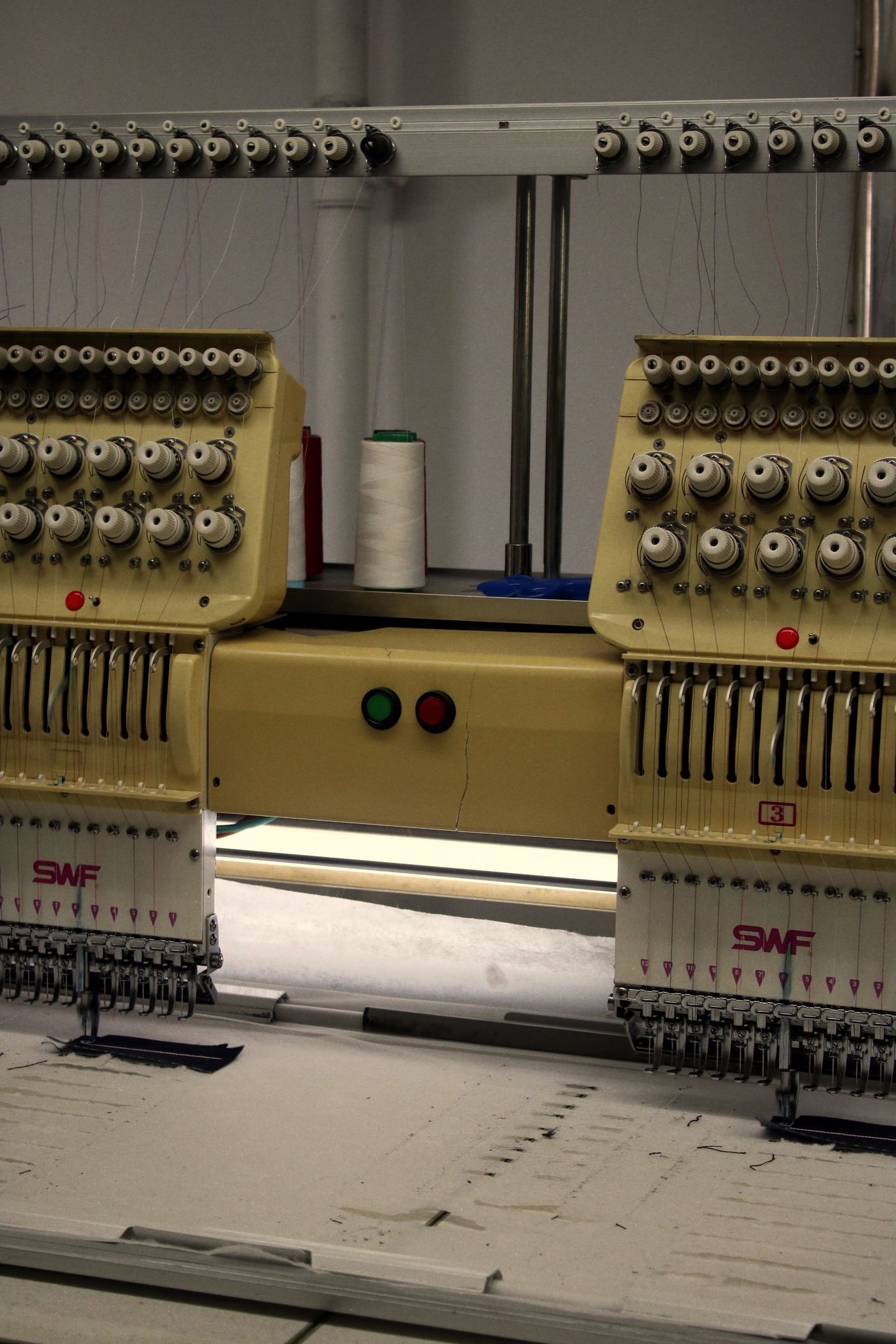 Embroidery machine creating garment detail
