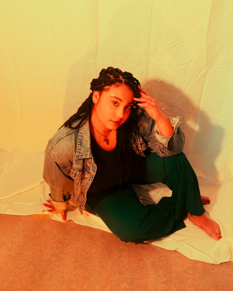 Woman In Casual Clothes Posing In Studio