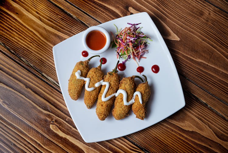 Deep Fried Coated Green Pepper In A Plate