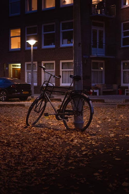 Bike Parked Beside a Post