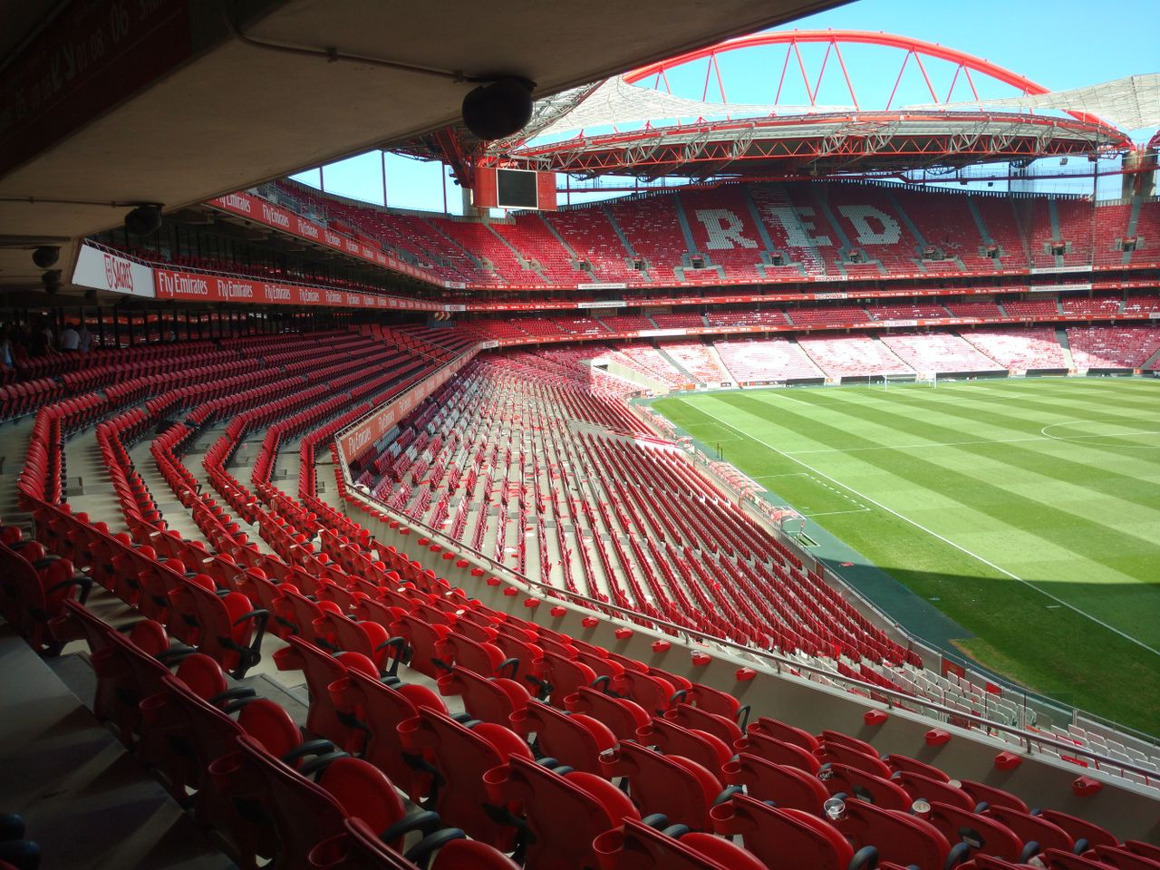wide angle shot of the empty est dio da luz s bleachers and soccer fie