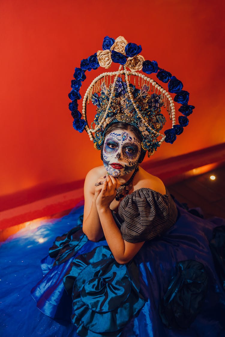 Woman In Purple Dress Wearing Floral Headdress