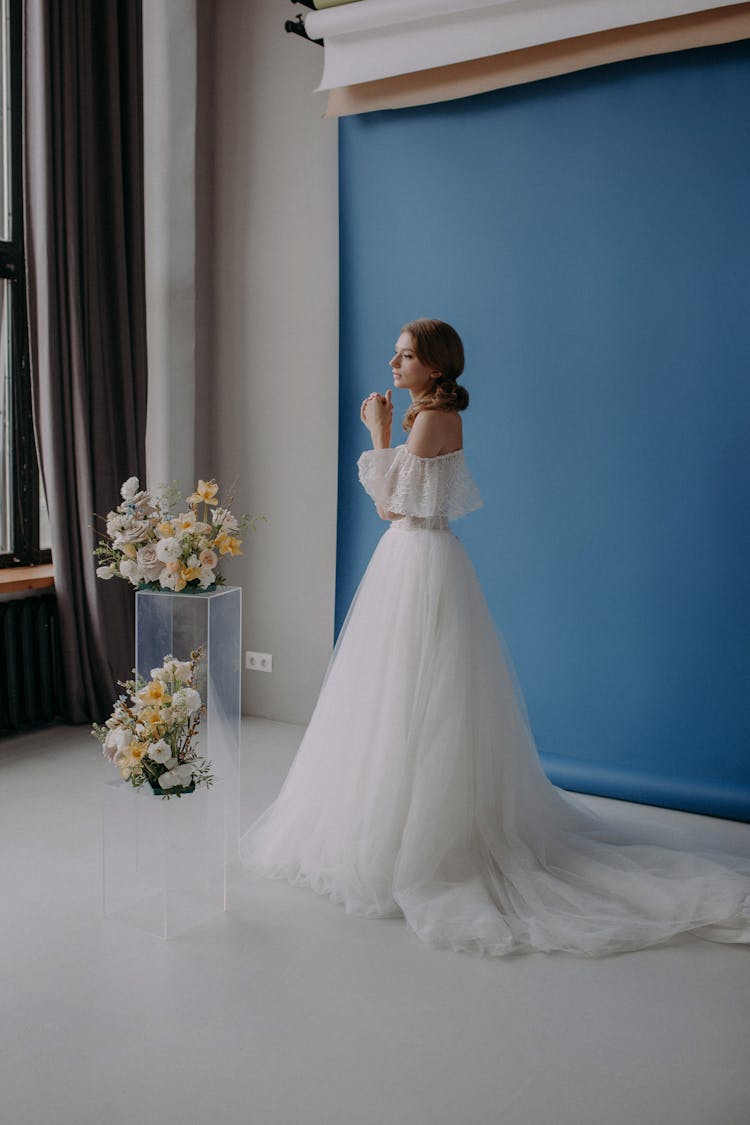 Woman Wearing White Wedding Gown