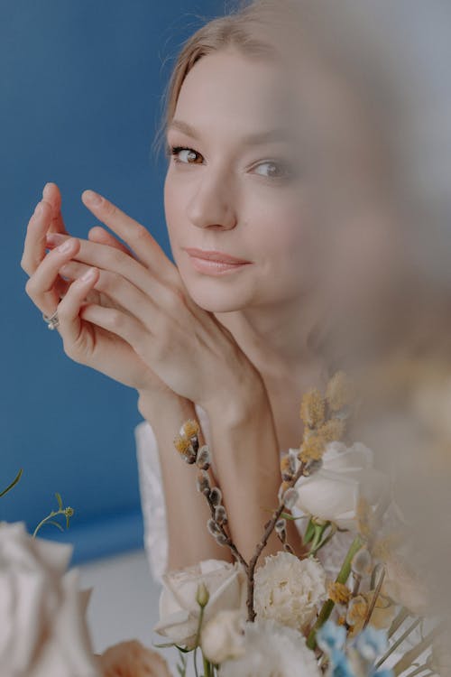 A Woman Beside Flowers 