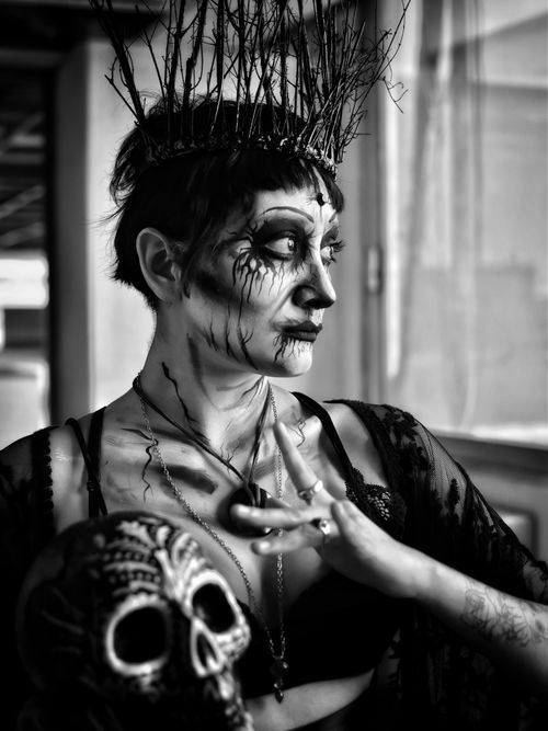 Free Black and white portrait of a woman in creative makeup, exuding drama and artistry. Stock Photo