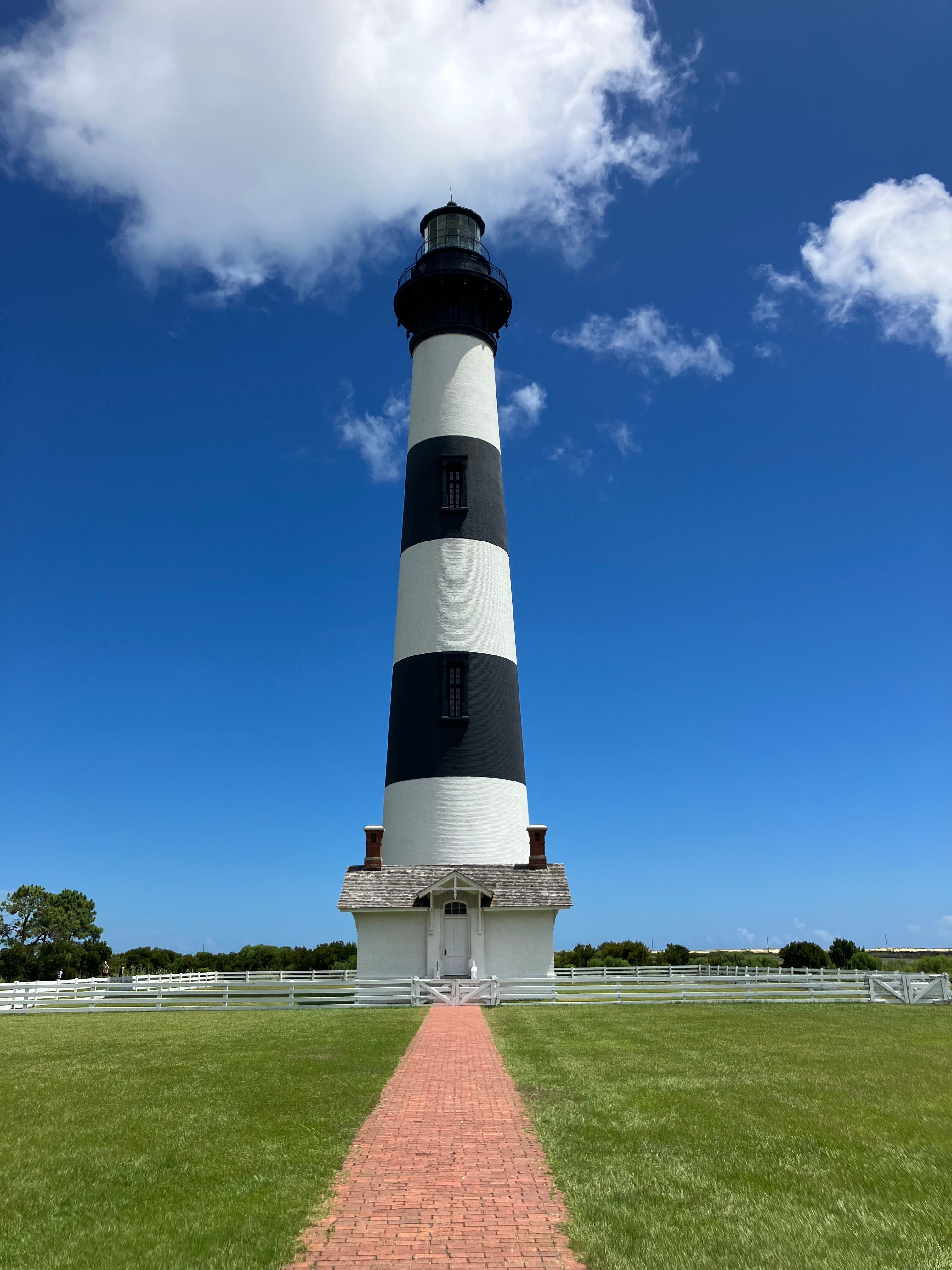 Blue and White Lighthouse Photo · Free Stock Photo