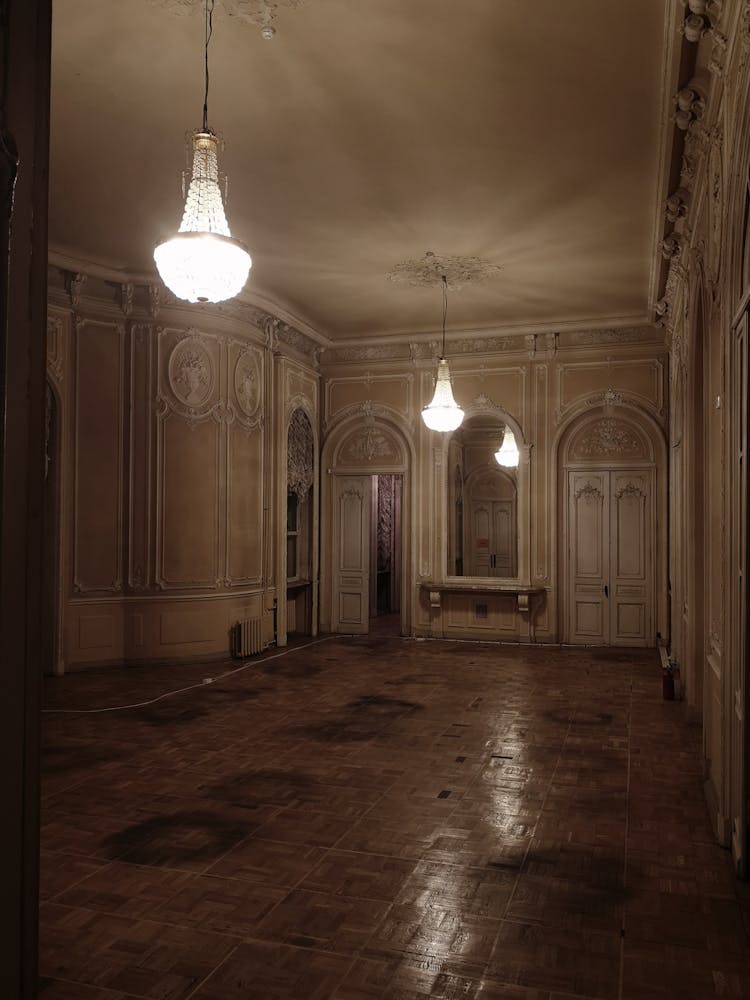 Abandoned House With Wooden Interior And Pendant Lamps