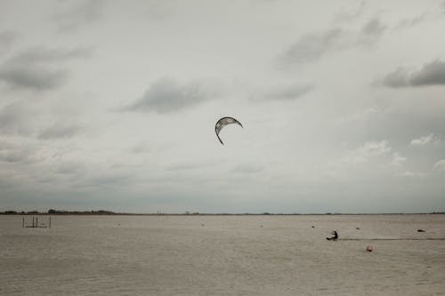 Photo of a Person Practicing Kitesurfing