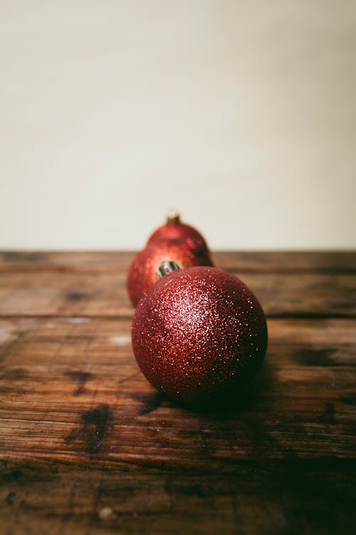 Red Round Fruit on Brown Wooden Table