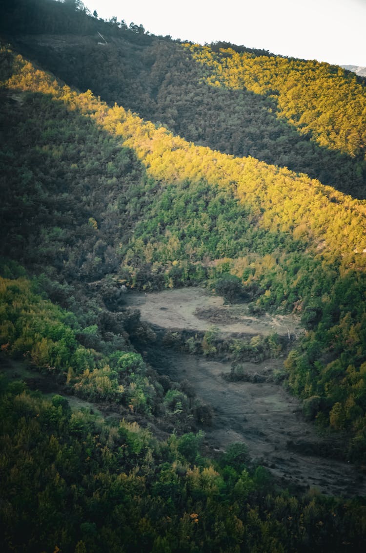 A Flat Land On A Green Mountain