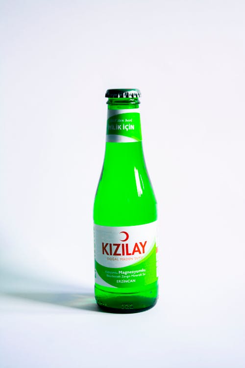Gratis lagerfoto af glas, grøn flaske, hvid baggrund