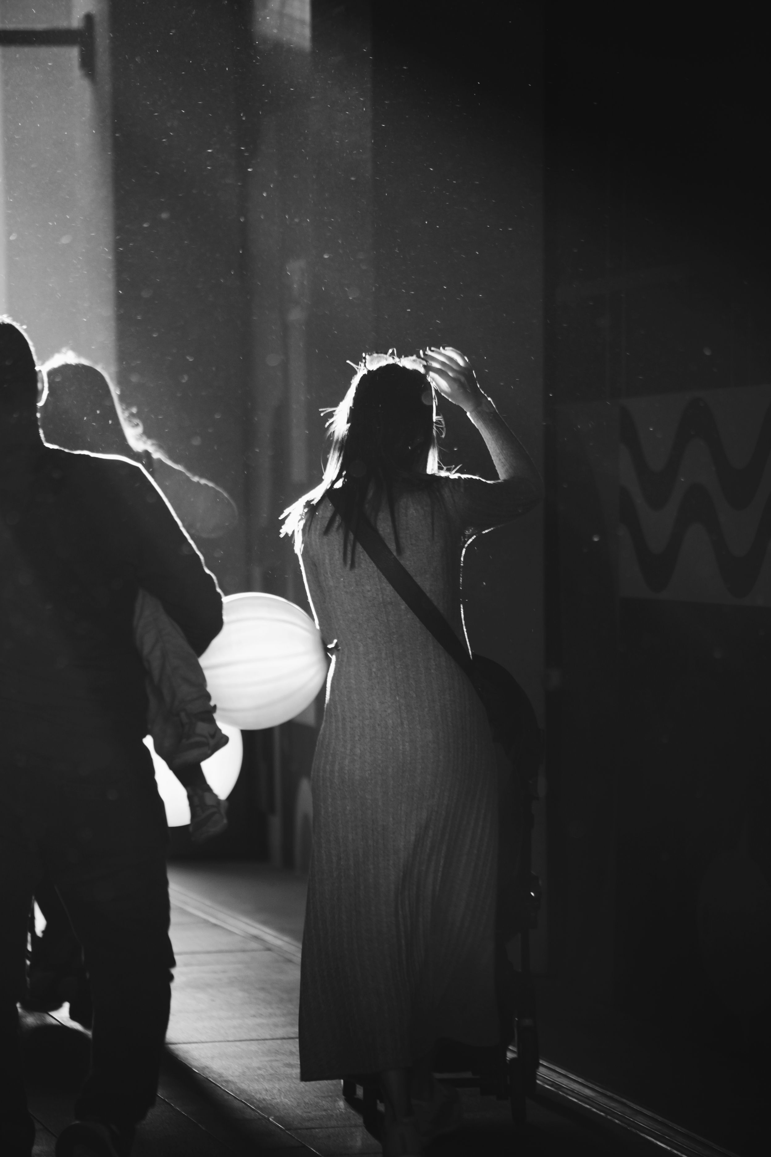 Grayscale Photo of a Woman in a Dress · Free Stock Photo