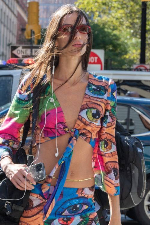 A Sexy Woman Wearing Printed Outfit while Walking on the Street Free Stock Photo A Sexy Woman Wearing Printed Outfit while Walking on the Street Free Stock Photo