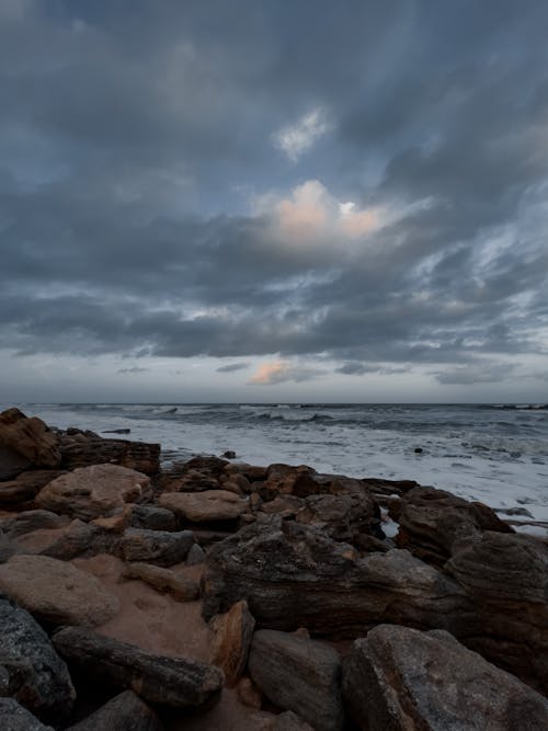 Photograph of Rocks near an Ocean