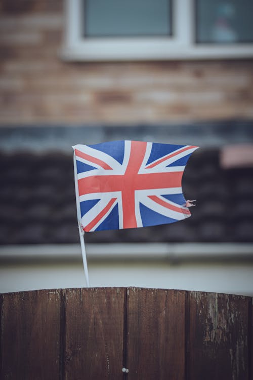 British Flag on Wooden Fence