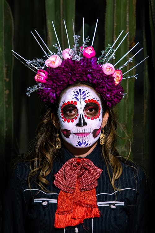 Woman in Catrina Makeup Wearing a Floral Headdress