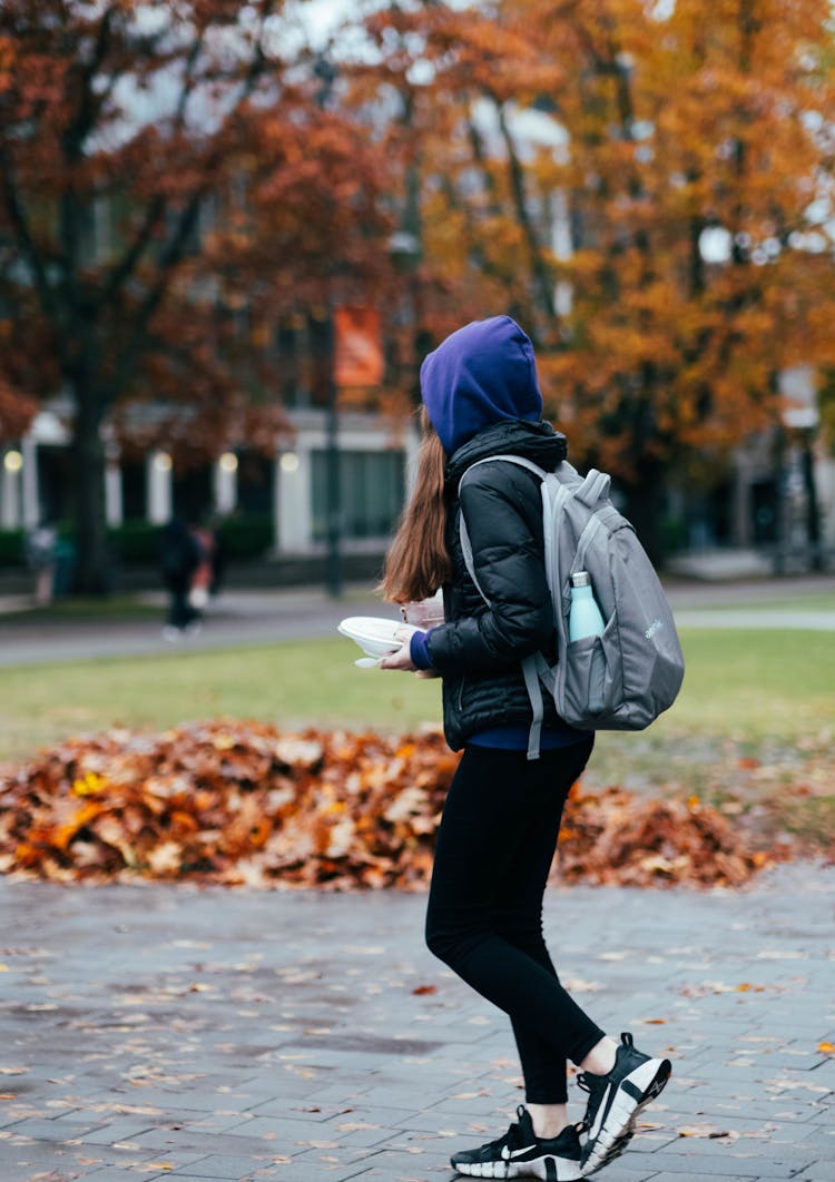 Woman Carrying Gray Backpack