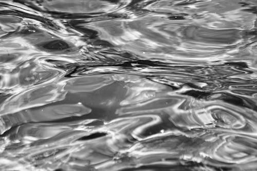 Grayscale Photo of Water Surface