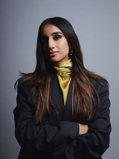 Portrait of a Woman in a Black Blazer Posing