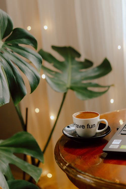 A Cup of Coffee on a Wooden table