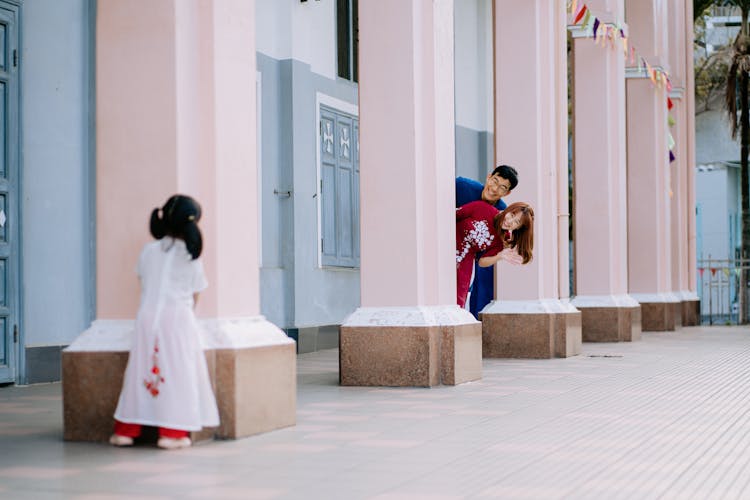 Parents Playing With Their Daughter