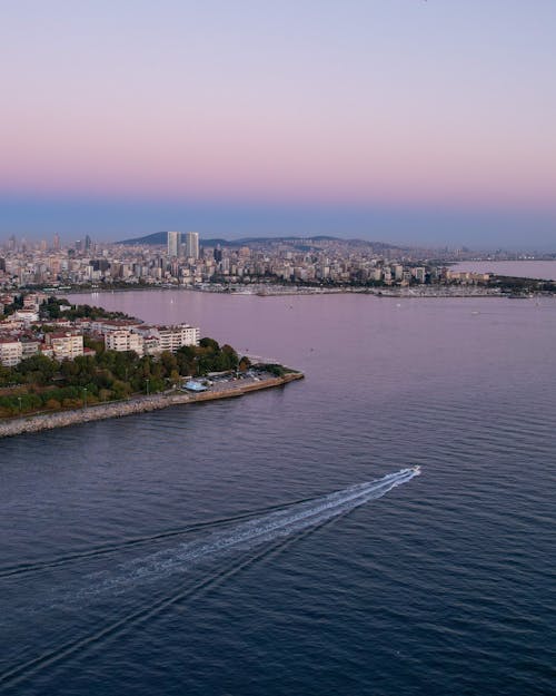 Aerial View of Buildings near Body of Water