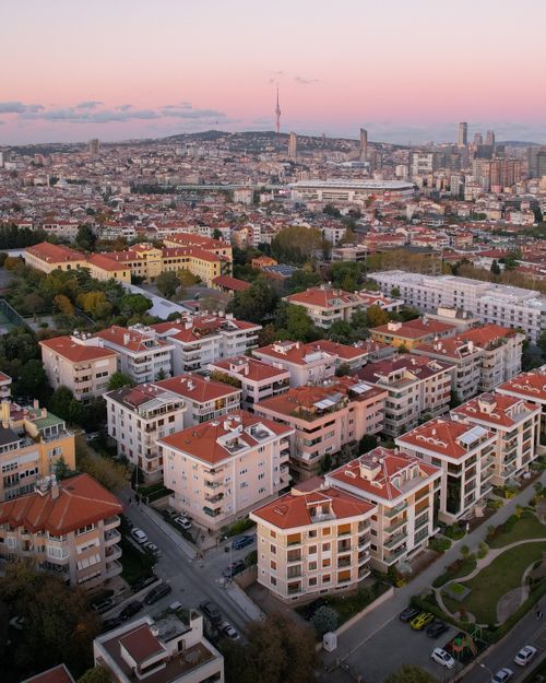 Free Stunning aerial view of residential buildings in Kadikoy, Istanbul with a sunset backdrop. Stock Photo
