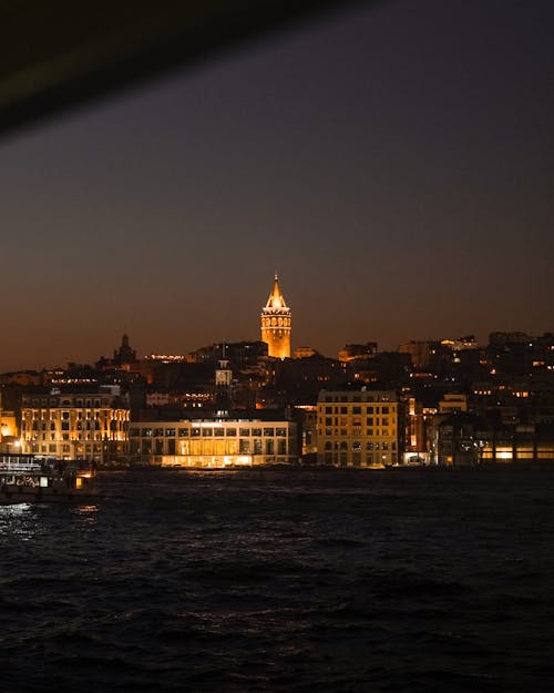 Illuminated Istanbul at Night seen from the Bosphorus Strait 