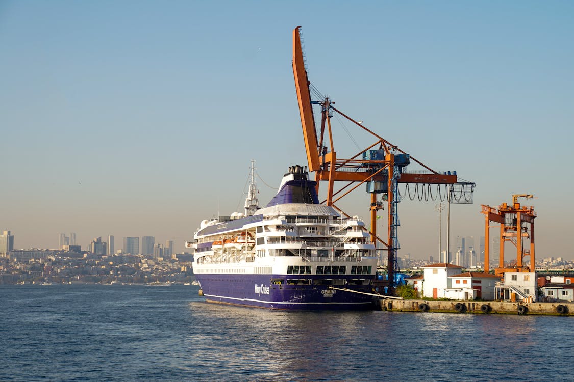White and Purple Ship on Sea