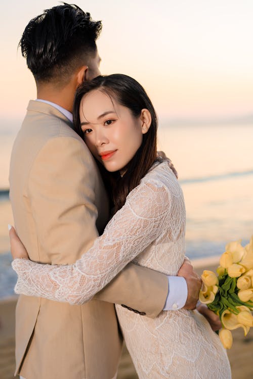 Foto profissional grátis de afeição, amor, casamento na praia