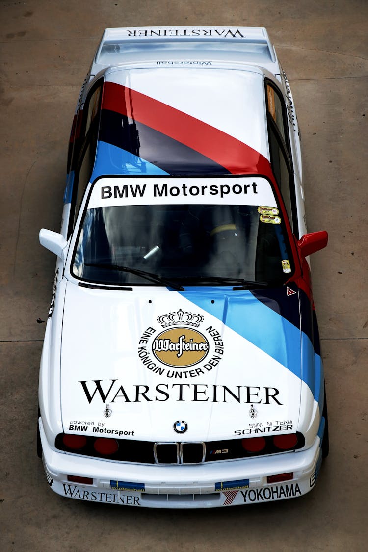 Racing Car With Stickers Parked On The Street