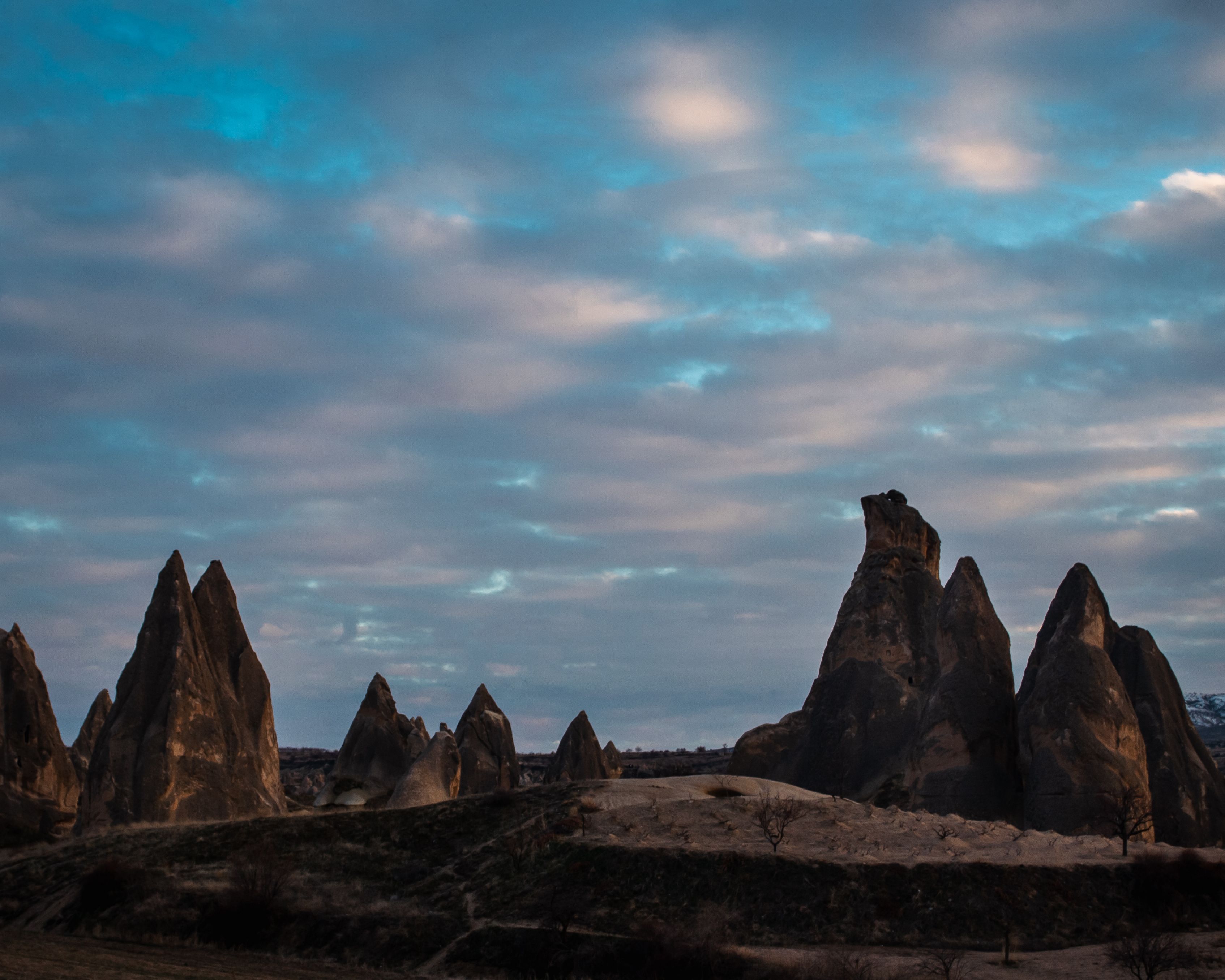 A Rock Formation Under the Cloudy Sky · Free Stock Photo