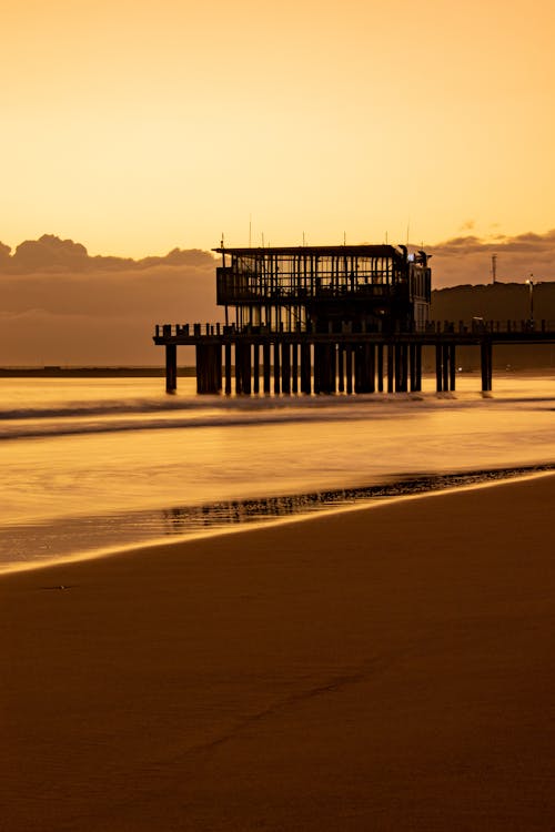 Silhouette of a Pier at the Beach 